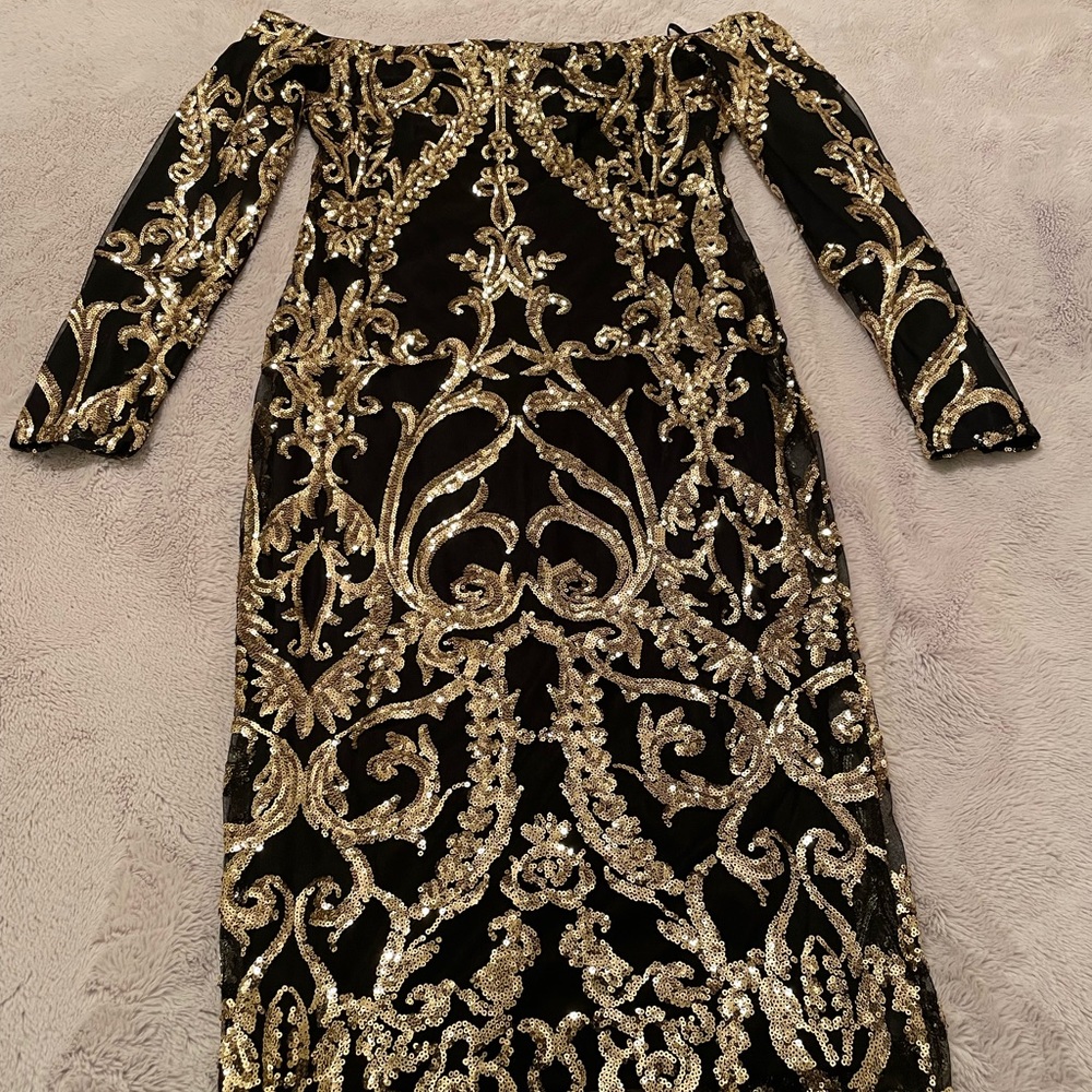 Off the shoulder black and gold dress